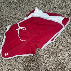 Under Armour red/maroon size small women’s Shorts.